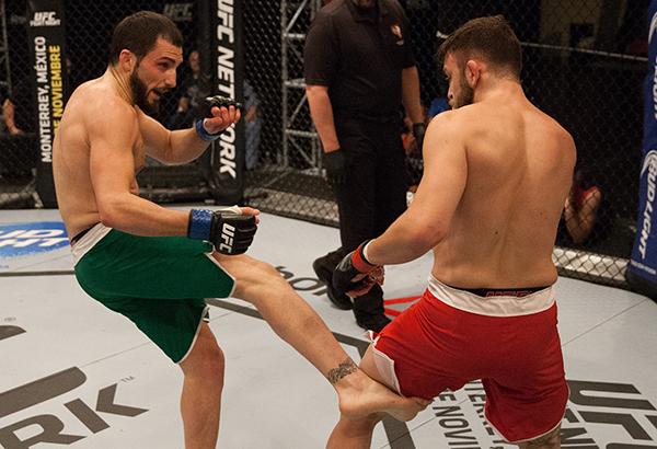 LAS VEGAS, NV - APRIL 3: (L-R) Enrique Marin kicks Kevin Mendinilla during the filming of The Ultimate Fighter Latin America: Team Gastelum vs Team Escudero on April 3, 2015 in Las Vegas, Nevada. (Photo by Brandon Magnus/Zuffa LLC/Zuffa LLC via Getty Im
