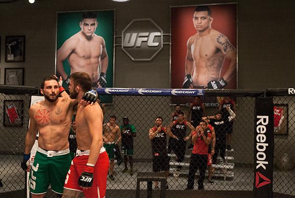LAS VEGAS, NV - APRIL 3: (L-R) Enrique Marin and Kevin Mendinilla hug after their fight during the filming of The Ultimate Fighter Latin America: Team Gastelum vs Team Escudero on April 3, 2015 in Las Vegas, Nevada. (Photo by Brandon Magnus/Zuffa LLC/Zu
