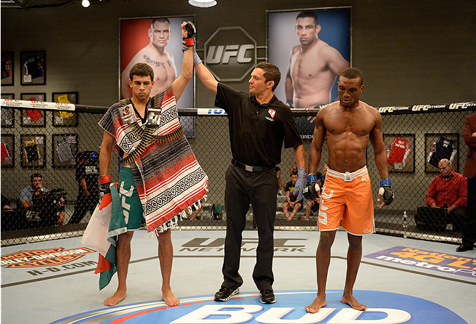 LAS VEGAS, NV - MAY 30: Team Velasquez fighter Yair Rodriguez celebrates his victory over team Werdum fighter Humberto Brown in their preliminary fight during filming of The Ultimate Fighter Latin America on May 30, 2014 in Las Vegas, Nevada. (Photo by J
