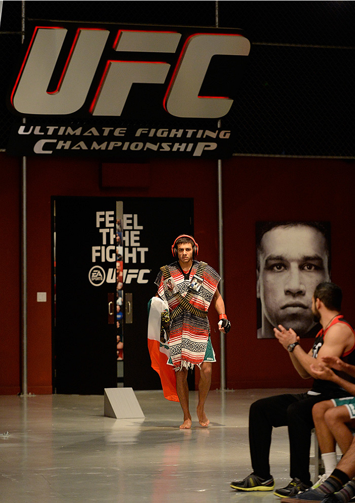 LAS VEGAS, NV - MAY 30: Team Velasquez fighter Yair Rodriguez prepares to enter the Octagon before facing team Werdum fighter Humberto Brown in their preliminary fight during filming of The Ultimate Fighter Latin America on May 30, 2014 in Las Vegas, Nev