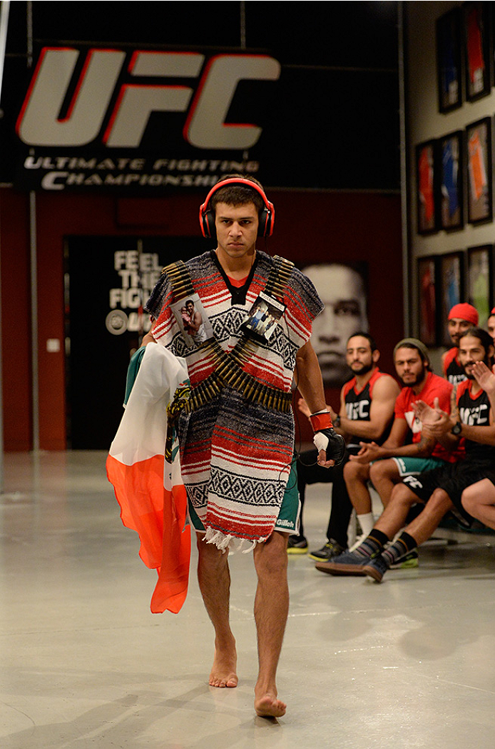 LAS VEGAS, NV - MAY 30: Team Velasquez fighter Yair Rodriguez prepares to enter the Octagon before facing team Werdum fighter Humberto Brown in their preliminary fight during filming of The Ultimate Fighter Latin America on May 30, 2014 in Las Vegas, Nev