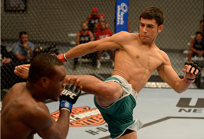 LAS VEGAS, NV - MAY 30: (R-L) Team Velasquez fighter Yair Rodriguez kicks team Werdum fighter Humberto Brown in their preliminary fight during filming of The Ultimate Fighter Latin America on May 30, 2014 in Las Vegas, Nevada. (Photo by Jeff Bottari/Zuff