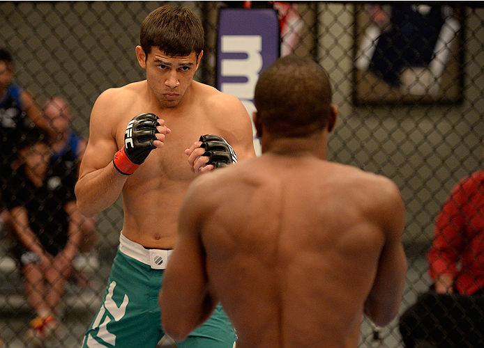 LAS VEGAS, NV - MAY 30: (R-L) Team Velasquez fighter Yair Rodriguez circles around team Werdum fighter Humberto Brown in their preliminary fight during filming of The Ultimate Fighter Latin America on May 30, 2014 in Las Vegas, Nevada. (Photo by Jeff Bot