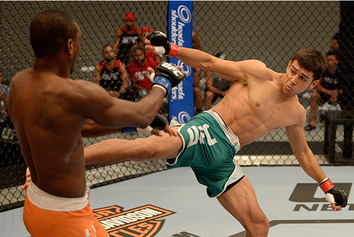 LAS VEGAS, NV - MAY 30: (R-L) Team Velasquez fighter Yair Rodriguez kicks team Werdum fighter Humberto Brown in their preliminary fight during filming of The Ultimate Fighter Latin America on May 30, 2014 in Las Vegas, Nevada. (Photo by Jeff Bottari/Zuff
