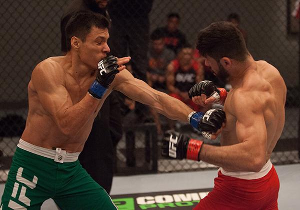 LAS VEGAS, NV - APRIL 14: (L-R) Christhian Soto punches Polo Reyes during the filming of The Ultimate Fighter Latin America: Team Gastelum vs Team Escudero on April 14, 2015 in Las Vegas, Nevada. (Photo by Brandon Magnus/Zuffa LLC/Zuffa LLC via Getty Im