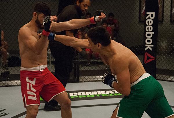 LAS VEGAS, NV - APRIL 14: (R-L) Christhian Soto punches Polo Reyes during the filming of The Ultimate Fighter Latin America: Team Gastelum vs Team Escudero on April 14, 2015 in Las Vegas, Nevada. (Photo by Brandon Magnus/Zuffa LLC/Zuffa LLC via Getty Im