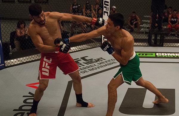 LAS VEGAS, NV - APRIL 14: (R-L) Christhian Soto punches Polo Reyes during the filming of The Ultimate Fighter Latin America: Team Gastelum vs Team Escudero on April 14, 2015 in Las Vegas, Nevada. (Photo by Brandon Magnus/Zuffa LLC/Zuffa LLC via Getty Im