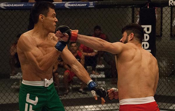 LAS VEGAS, NV - APRIL 14: (R-L) Polo Reyes punches Christhian Soto during the filming of The Ultimate Fighter Latin America: Team Gastelum vs Team Escudero on April 14, 2015 in Las Vegas, Nevada. (Photo by Brandon Magnus/Zuffa LLC/Zuffa LLC via Getty Im