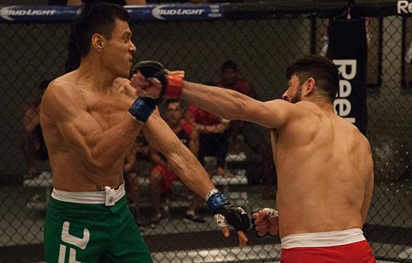 LAS VEGAS, NV - APRIL 14:  (R-L) Polo Reyes punches Christhian Soto during the filming of The Ultimate Fighter Latin America: Team Gastelum vs Team Escudero  on April 14, 2015 in Las Vegas, Nevada. (Photo by Brandon Magnus/Zuffa LLC/Zuffa LLC via Getty Im