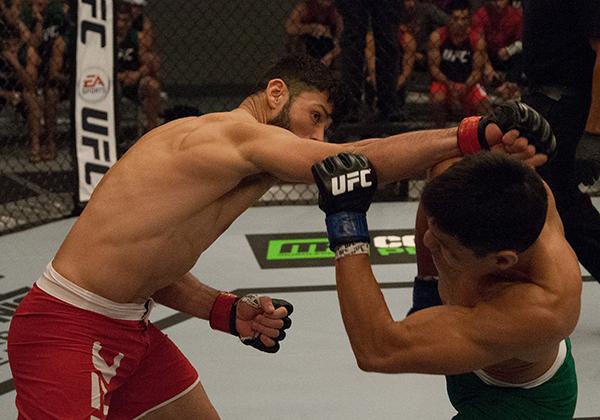 LAS VEGAS, NV - APRIL 14:  (L-R) Polo Reyes punches Christhian Soto during the filming of The Ultimate Fighter Latin America: Team Gastelum vs Team Escudero  on April 14, 2015 in Las Vegas, Nevada. (Photo by Brandon Magnus/Zuffa LLC/Zuffa LLC via Getty Im