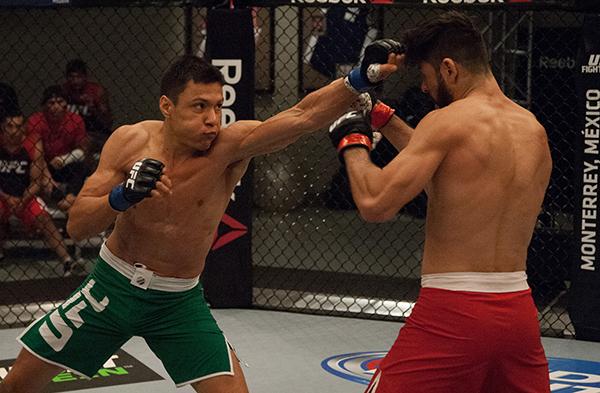 LAS VEGAS, NV - APRIL 14: (L-R) Christhian Soto punches Polo Reyes during the filming of The Ultimate Fighter Latin America: Team Gastelum vs Team Escudero on April 14, 2015 in Las Vegas, Nevada. (Photo by Brandon Magnus/Zuffa LLC/Zuffa LLC via Getty Im