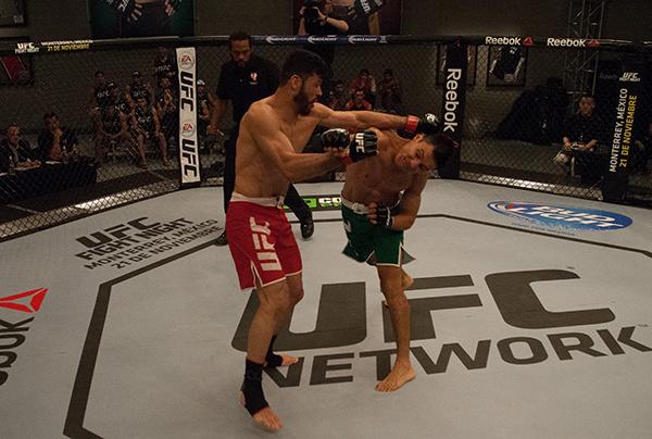 LAS VEGAS, NV - APRIL 14:  (R-L) Christhian Soto exchanges punches with Polo Reyes during the filming of The Ultimate Fighter Latin America: Team Gastelum vs Team Escudero  on April 14, 2015 in Las Vegas, Nevada. (Photo by Brandon Magnus/Zuffa LLC/Zuffa L