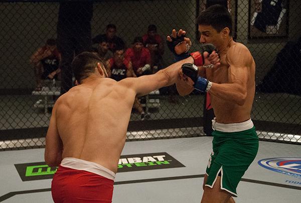 LAS VEGAS, NV - APRIL 14: (L-R) Polo Reyes punches Christhian Soto during the filming of The Ultimate Fighter Latin America: Team Gastelum vs Team Escudero on April 14, 2015 in Las Vegas, Nevada. (Photo by Brandon Magnus/Zuffa LLC/Zuffa LLC via Getty Im