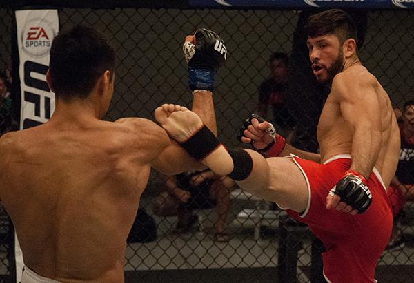 LAS VEGAS, NV - APRIL 14: (R-L) Polo Reyes kicks Christhian Soto during the filming of The Ultimate Fighter Latin America: Team Gastelum vs Team Escudero on April 14, 2015 in Las Vegas, Nevada. (Photo by Brandon Magnus/Zuffa LLC/Zuffa LLC via Getty Imag