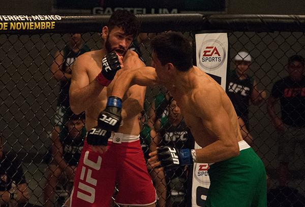 LAS VEGAS, NV - APRIL 14: (R-L) Christhian Soto punches Polo Reyes during the filming of The Ultimate Fighter Latin America: Team Gastelum vs Team Escudero on April 14, 2015 in Las Vegas, Nevada. (Photo by Brandon Magnus/Zuffa LLC/Zuffa LLC via Getty Im