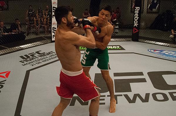 LAS VEGAS, NV - APRIL 14: (R-L) Christhian Soto punches Polo Reyes during the filming of The Ultimate Fighter Latin America: Team Gastelum vs Team Escudero on April 14, 2015 in Las Vegas, Nevada. (Photo by Brandon Magnus/Zuffa LLC/Zuffa LLC via Getty Im