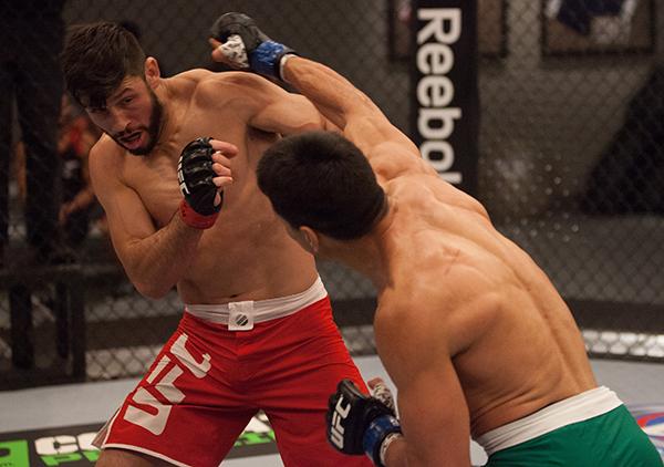 LAS VEGAS, NV - APRIL 14:  (R-L) Christhian Soto punches Polo Reyes during the filming of The Ultimate Fighter Latin America: Team Gastelum vs Team Escudero  on April 14, 2015 in Las Vegas, Nevada. (Photo by Brandon Magnus/Zuffa LLC/Zuffa LLC via Getty Im