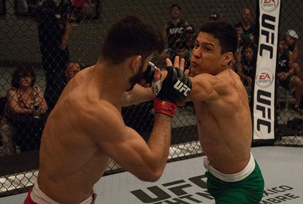 LAS VEGAS, NV - APRIL 14:  (R-L) Christhian Soto punches Polo Reyes during the filming of The Ultimate Fighter Latin America: Team Gastelum vs Team Escudero  on April 14, 2015 in Las Vegas, Nevada. (Photo by Brandon Magnus/Zuffa LLC/Zuffa LLC via Getty Im