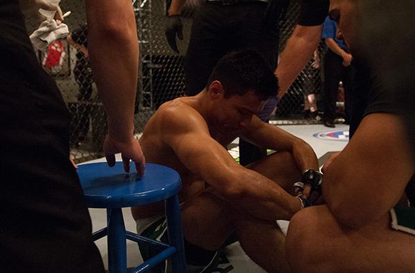 LAS VEGAS, NV - APRIL 14:  Christhian Soto catches his breath after facing Polo Reyes during the filming of The Ultimate Fighter Latin America: Team Gastelum vs Team Escudero  on April 14, 2015 in Las Vegas, Nevada. (Photo by Brandon Magnus/Zuffa LLC/Zuff