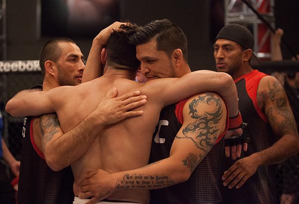 LAS VEGAS, NV - APRIL 14: Polo Reyes hugs his team after facing Christhian Soto during the filming of The Ultimate Fighter Latin America: Team Gastelum vs Team Escudero on April 14, 2015 in Las Vegas, Nevada. (Photo by Brandon Magnus/Zuffa LLC/Zuffa LLC