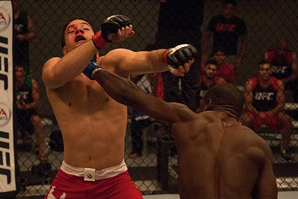 LAS VEGAS, NV - APRIL 14: (R-L) Wilmer Fernandez punches Vernon Ramos during the filming of The Ultimate Fighter Latin America: Team Gastelum vs Team Escudero on April 14, 2015 in Las Vegas, Nevada. (Photo by Brandon Magnus/Zuffa LLC/Zuffa LLC via Getty