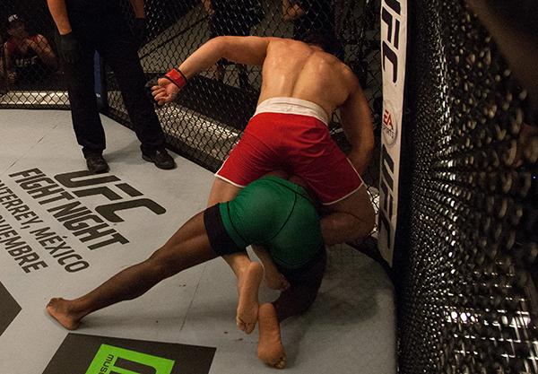 LAS VEGAS, NV - APRIL 14: Vernon Ramos (top) punches Wilmer Fernandez during the filming of The Ultimate Fighter Latin America: Team Gastelum vs Team Escudero on April 14, 2015 in Las Vegas, Nevada. (Photo by Brandon Magnus/Zuffa LLC/Zuffa LLC via Getty