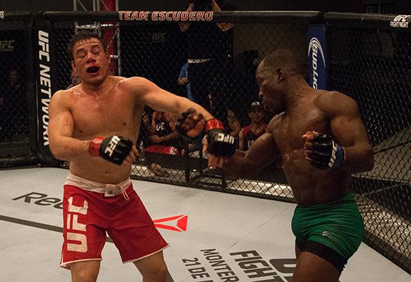LAS VEGAS, NV - APRIL 14: (R-L) Wilmer Fernandez punches Vernon Ramos during the filming of The Ultimate Fighter Latin America: Team Gastelum vs Team Escudero on April 14, 2015 in Las Vegas, Nevada. (Photo by Brandon Magnus/Zuffa LLC/Zuffa LLC via Getty