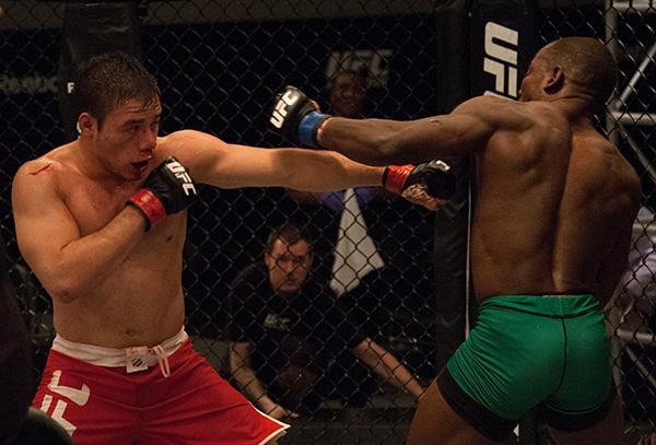 LAS VEGAS, NV - APRIL 14: (L-R) Vernon Ramos punches Wilmer Fernandez during the filming of The Ultimate Fighter Latin America: Team Gastelum vs Team Escudero on April 14, 2015 in Las Vegas, Nevada. (Photo by Brandon Magnus/Zuffa LLC/Zuffa LLC via Getty