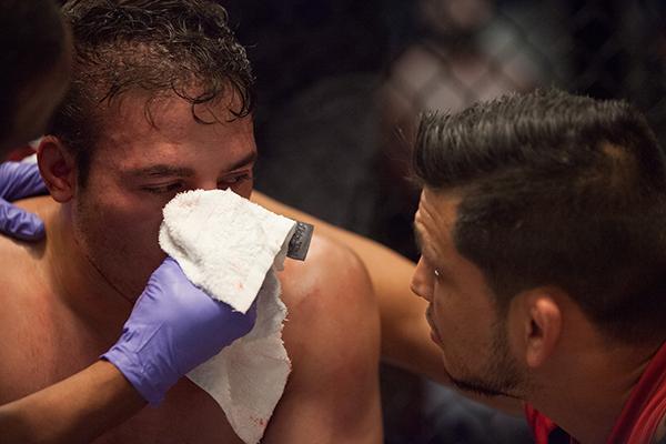 LAS VEGAS, NV - APRIL 14: Vernon Ramos receives advice from his corner in between rounds while facing Wilmer Fernandez during the filming of The Ultimate Fighter Latin America: Team Gastelum vs Team Escudero on April 14, 2015 in Las Vegas, Nevada. (Phot