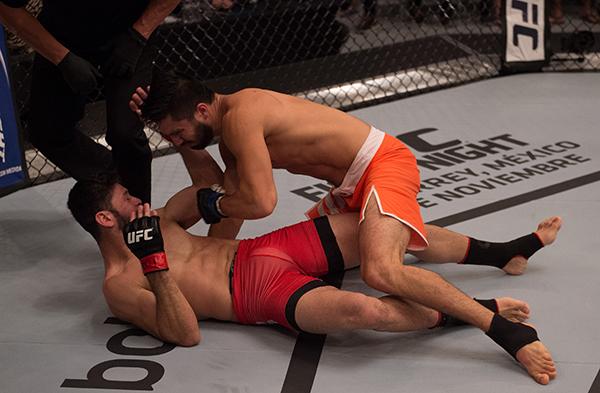 LAS VEGAS, NV - APRIL 21: Horacio Gutrierrez (top) punches Polo Reyes in their semi-finals fight during the filming of The Ultimate Fighter Latin America: Team Gastelum vs Team Escudero on April 21, 2015 in Las Vegas, Nevada. (Photo by Brandon Magnus/Zuf