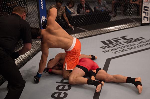 LAS VEGAS, NV - APRIL 21: Horacio Gutrierrez (top) punches Polo Reyes in their semi-finals fight during the filming of The Ultimate Fighter Latin America: Team Gastelum vs Team Escudero on April 21, 2015 in Las Vegas, Nevada. (Photo by Brandon Magnus/Zuf