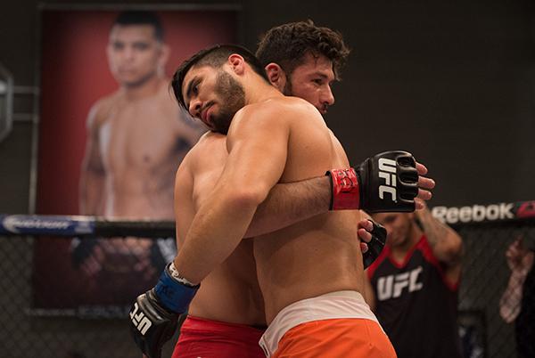 LAS VEGAS, NV - APRIL 21: (R-L) Horacio Gutrierrez chugs Polo Reyes after their semi-finals fight during the filming of The Ultimate Fighter Latin America: Team Gastelum vs Team Escudero on April 21, 2015 in Las Vegas, Nevada. (Photo by Brandon Magnus/Zu