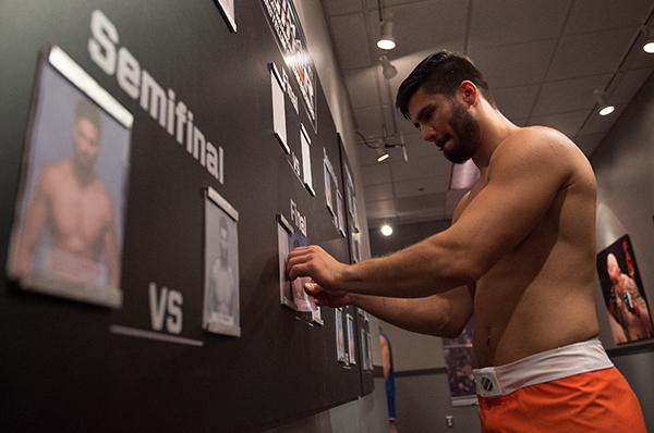 LAS VEGAS, NV - APRIL 21: Horacio Gutrierrez moves his card to the finals after defeating Polo Reyes in their semi-finals fight during the filming of The Ultimate Fighter Latin America: Team Gastelum vs Team Escudero on April 21, 2015 in Las Vegas, Nevad