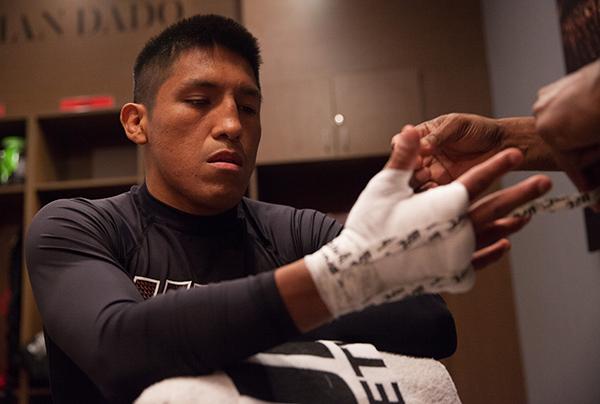 LAS VEGAS, NV - APRIL 7: Enrique Barzola gets his hands wrapped before facing Jonathan Ortega during the filming of The Ultimate Fighter Latin America: Team Gastelum vs Team Escudero on April 7, 2015 in Las Vegas, Nevada. (Photo by Brandon Magnus/Zuffa