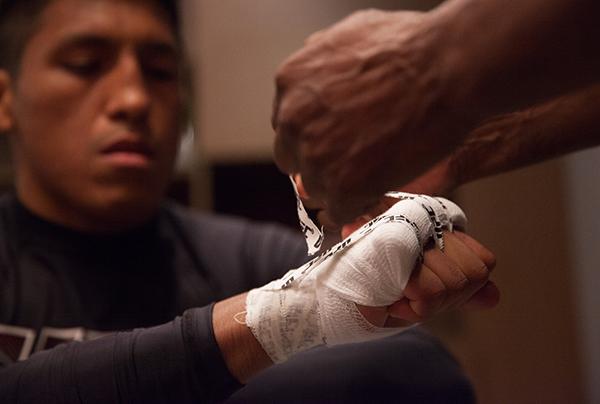LAS VEGAS, NV - APRIL 7: Enrique Barzola gets his hands wrapped before facing Jonathan Ortega during the filming of The Ultimate Fighter Latin America: Team Gastelum vs Team Escudero on April 7, 2015 in Las Vegas, Nevada. (Photo by Brandon Magnus/Zuffa