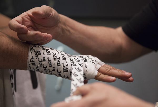 LAS VEGAS, NV - APRIL 7: Jonathan Ortega gets his hands wrapped before facing Enrique Barzola during the filming of The Ultimate Fighter Latin America: Team Gastelum vs Team Escudero on April 7, 2015 in Las Vegas, Nevada. (Photo by Brandon Magnus/Zuffa