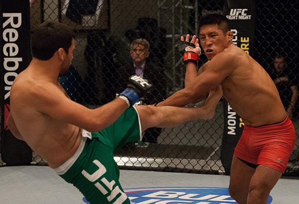 LAS VEGAS, NV - APRIL 7: (L-R) Jonathan Ortega kicks Enrique Barzola during the filming of The Ultimate Fighter Latin America: Team Gastelum vs Team Escudero on April 7, 2015 in Las Vegas, Nevada. (Photo by Brandon Magnus/Zuffa LLC/Zuffa LLC via Getty I