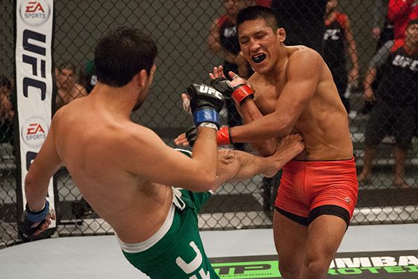 LAS VEGAS, NV - APRIL 7: (L-R) Jonathan Ortega kicks Enrique Barzola during the filming of The Ultimate Fighter Latin America: Team Gastelum vs Team Escudero on April 7, 2015 in Las Vegas, Nevada. (Photo by Brandon Magnus/Zuffa LLC/Zuffa LLC via Getty I