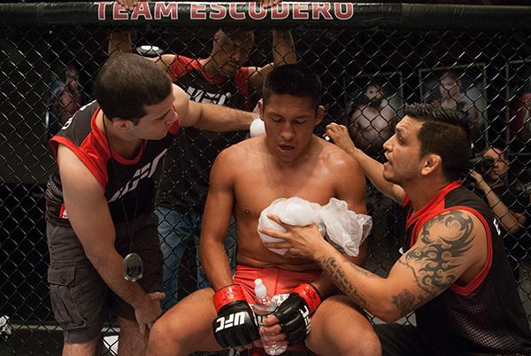 LAS VEGAS, NV - APRIL 7: Enrique Barzola receives advice from his corner while facing Jonathan Ortega during the filming of The Ultimate Fighter Latin America: Team Gastelum vs Team Escudero on April 7, 2015 in Las Vegas, Nevada. (Photo by Brandon Magnu