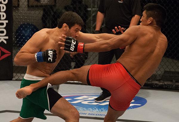 LAS VEGAS, NV - APRIL 7: (L-R) Jonathan Ortega punches Enrique Barzola during the filming of The Ultimate Fighter Latin America: Team Gastelum vs Team Escudero on April 7, 2015 in Las Vegas, Nevada. (Photo by Brandon Magnus/Zuffa LLC/Zuffa LLC via Getty
