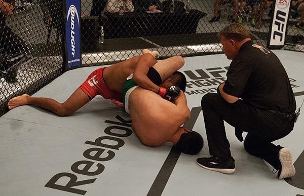LAS VEGAS, NV - APRIL 7: Jonathan Ortega attempts to submit Enrique Barzola during the filming of The Ultimate Fighter Latin America: Team Gastelum vs Team Escudero on April 7, 2015 in Las Vegas, Nevada. (Photo by Brandon Magnus/Zuffa LLC/Zuffa LLC via