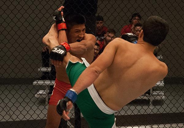 LAS VEGAS, NV - APRIL 7: (R-L) Jonathan Ortega kicks Enrique Barzola during the filming of The Ultimate Fighter Latin America: Team Gastelum vs Team Escudero on April 7, 2015 in Las Vegas, Nevada. (Photo by Brandon Magnus/Zuffa LLC/Zuffa LLC via Getty I
