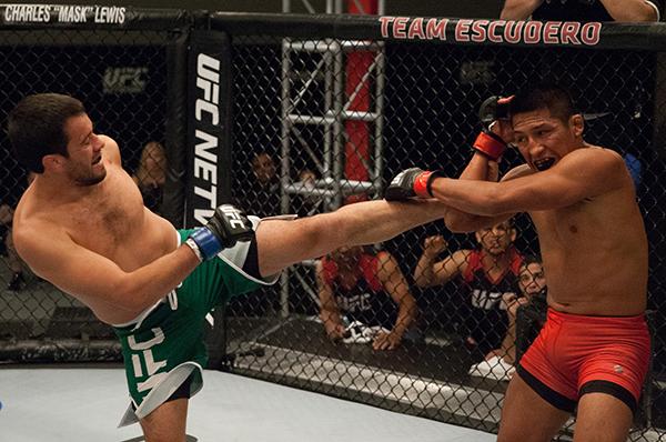 LAS VEGAS, NV - APRIL 7: (L-R) Jonathan Ortega kicks Enrique Barzola during the filming of The Ultimate Fighter Latin America: Team Gastelum vs Team Escudero on April 7, 2015 in Las Vegas, Nevada. (Photo by Brandon Magnus/Zuffa LLC/Zuffa LLC via Getty I