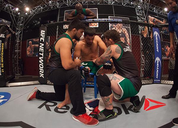 LAS VEGAS, NV - APRIL 7: Jonathan Ortega receives advice from his corner while facing Enrique Barzola during the filming of The Ultimate Fighter Latin America: Team Gastelum vs Team Escudero on April 7, 2015 in Las Vegas, Nevada. (Photo by Brandon Magnu