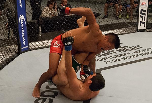 LAS VEGAS, NV - APRIL 7: Enrique Barzola (top) punches Jonathan Ortega during the filming of The Ultimate Fighter Latin America: Team Gastelum vs Team Escudero on April 7, 2015 in Las Vegas, Nevada. (Photo by Brandon Magnus/Zuffa LLC/Zuffa LLC via Getty