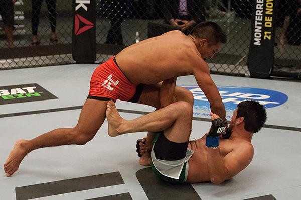 LAS VEGAS, NV - APRIL 7: Enrique Barzola (top) punches Jonathan Ortega during the filming of The Ultimate Fighter Latin America: Team Gastelum vs Team Escudero on April 7, 2015 in Las Vegas, Nevada. (Photo by Brandon Magnus/Zuffa LLC/Zuffa LLC via Getty