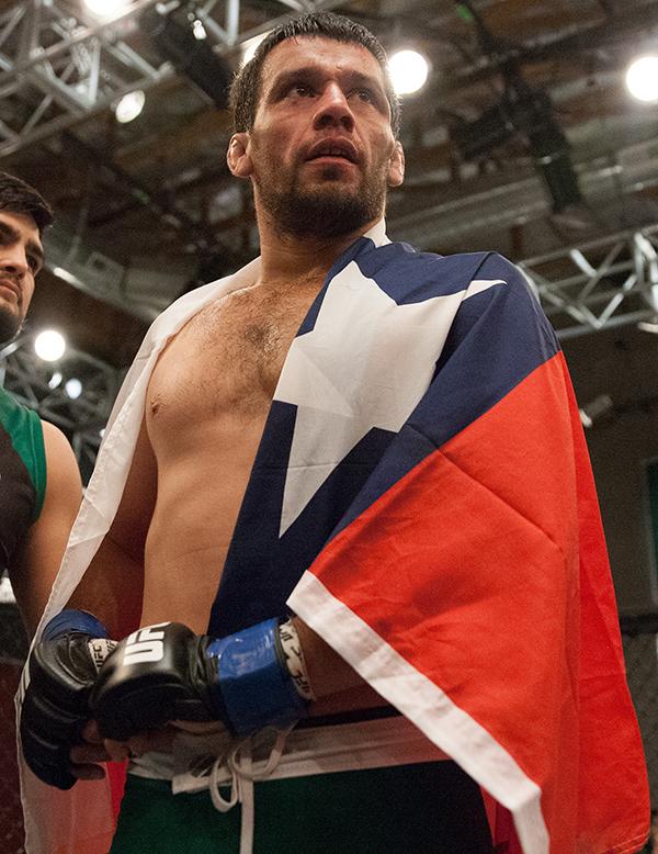 LAS VEGAS, NV - APRIL 7: Jonathan Ortega waits to hear the judges decision after his fight against Enrique Barzola during the filming of The Ultimate Fighter Latin America: Team Gastelum vs Team Escudero on April 7, 2015 in Las Vegas, Nevada. (Photo by