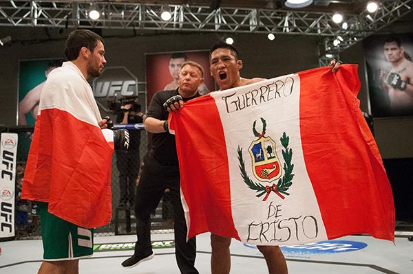 LAS VEGAS, NV - APRIL 7: (R-L) Enrique Barzola celebrates his victory over Jonathan Ortega during the filming of The Ultimate Fighter Latin America: Team Gastelum vs Team Escudero on April 7, 2015 in Las Vegas, Nevada. (Photo by Brandon Magnus/Zuffa LLC