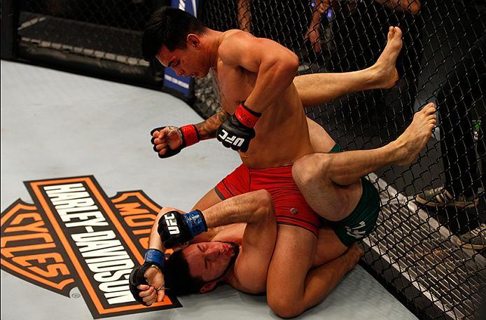 BUENOS AIRES, ARGENTINA - MAY 20: (R-L) Pablo Sabori punches Santiago Cardenas during the filming of The Ultimate Fighter Latin America: Team Liddell vs Team Griffin on May 20, 2016 in Buenos Aires, Argentina. (Photo by Gabriel Rossi/Zuffa LLC/Zuffa LLC