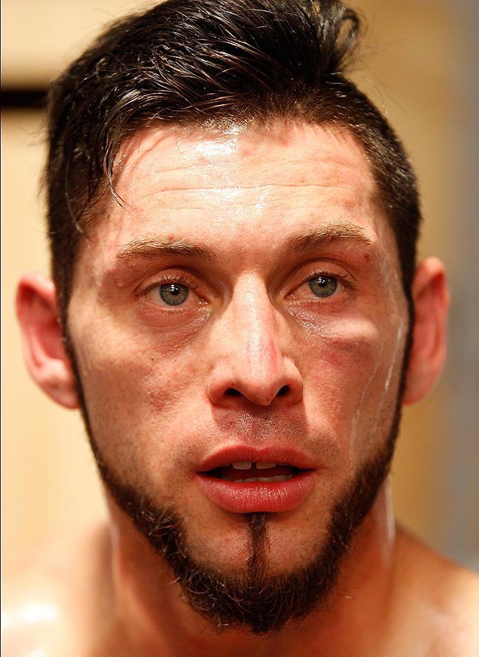 BUENOS AIRES, ARGENTINA - MAY 20: (R-L) Santiago Cardenas reacts to his submission loss to Pablo Sabori during the filming of The Ultimate Fighter Latin America: Team Liddell vs Team Griffin on May 20, 2016 in Buenos Aires, Argentina. (Photo by Gabriel R
